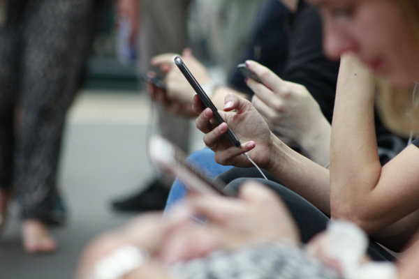 Woman holding a smartphone